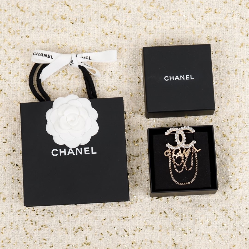 Ch*el brooches